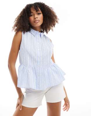 ASOS DESIGN sleeveless peplum shirt in blue broderie