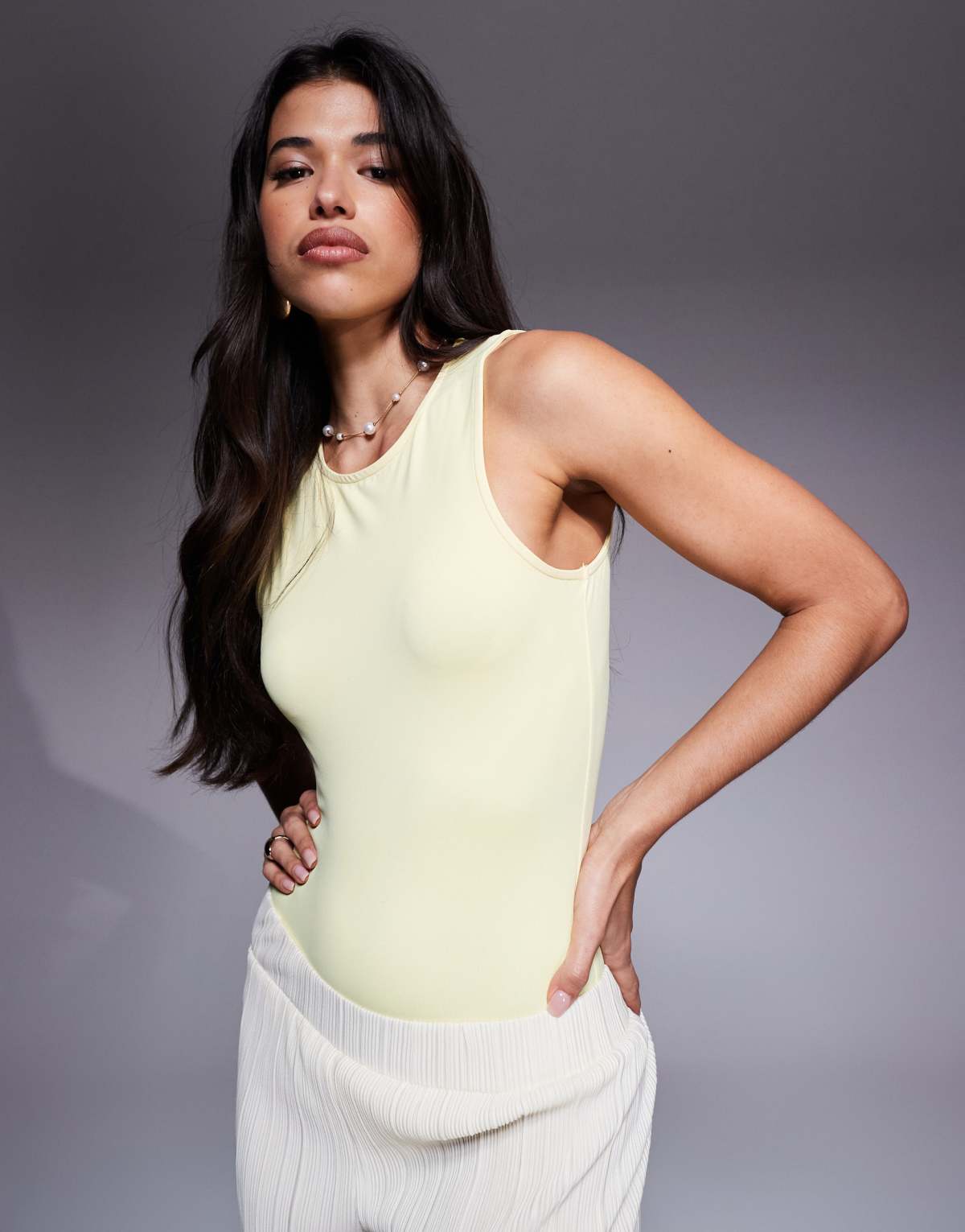 ASOS DESIGN sleeveless polyamide racer bodysuit in pastel yellow