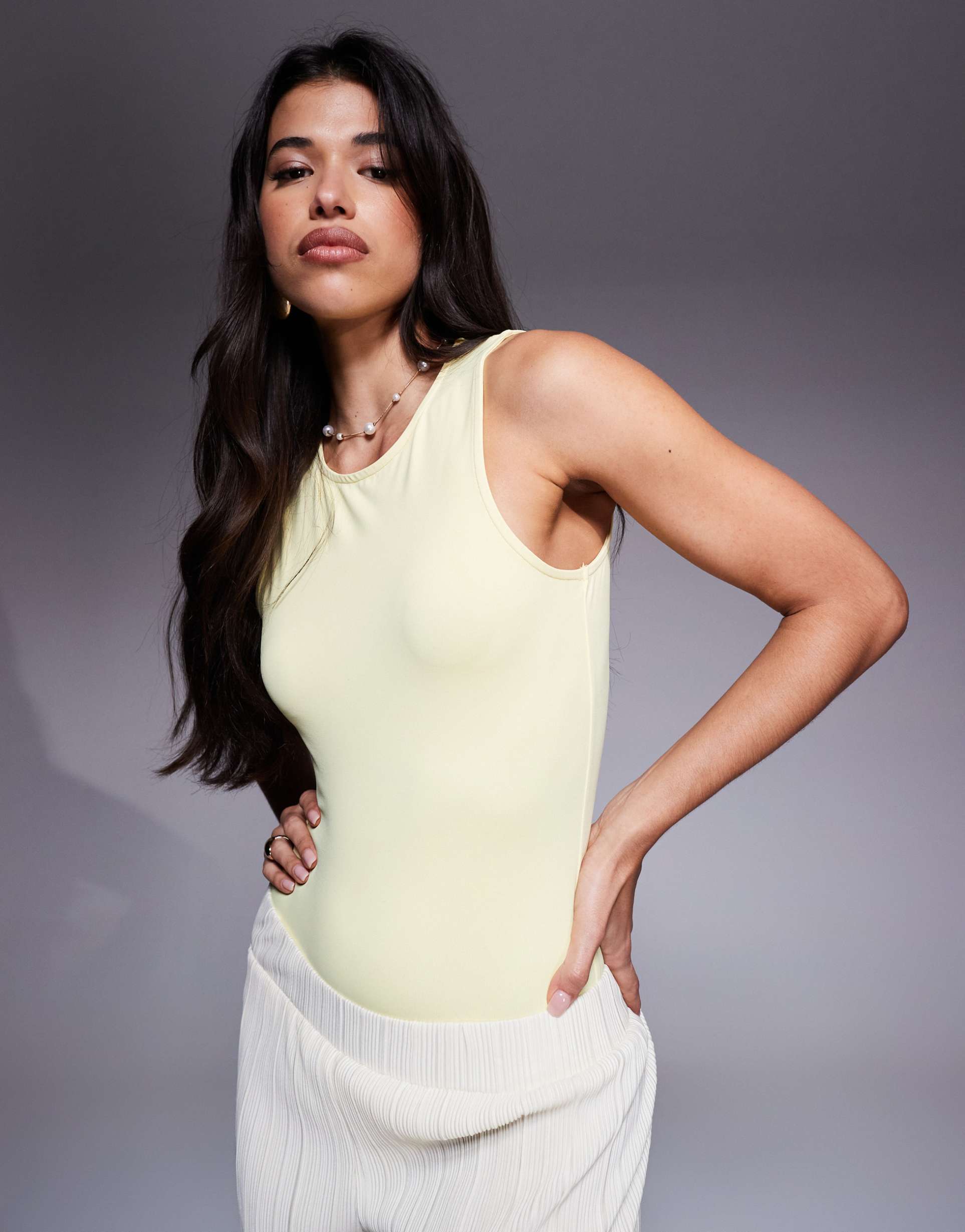 asos design sleeveless polyamide racer neck bodysuit in pastel yellow