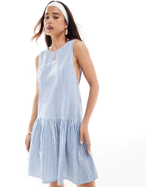 ASOS DESIGN sleeveless racer smock mini dress with tiered skirt in blue white stripe