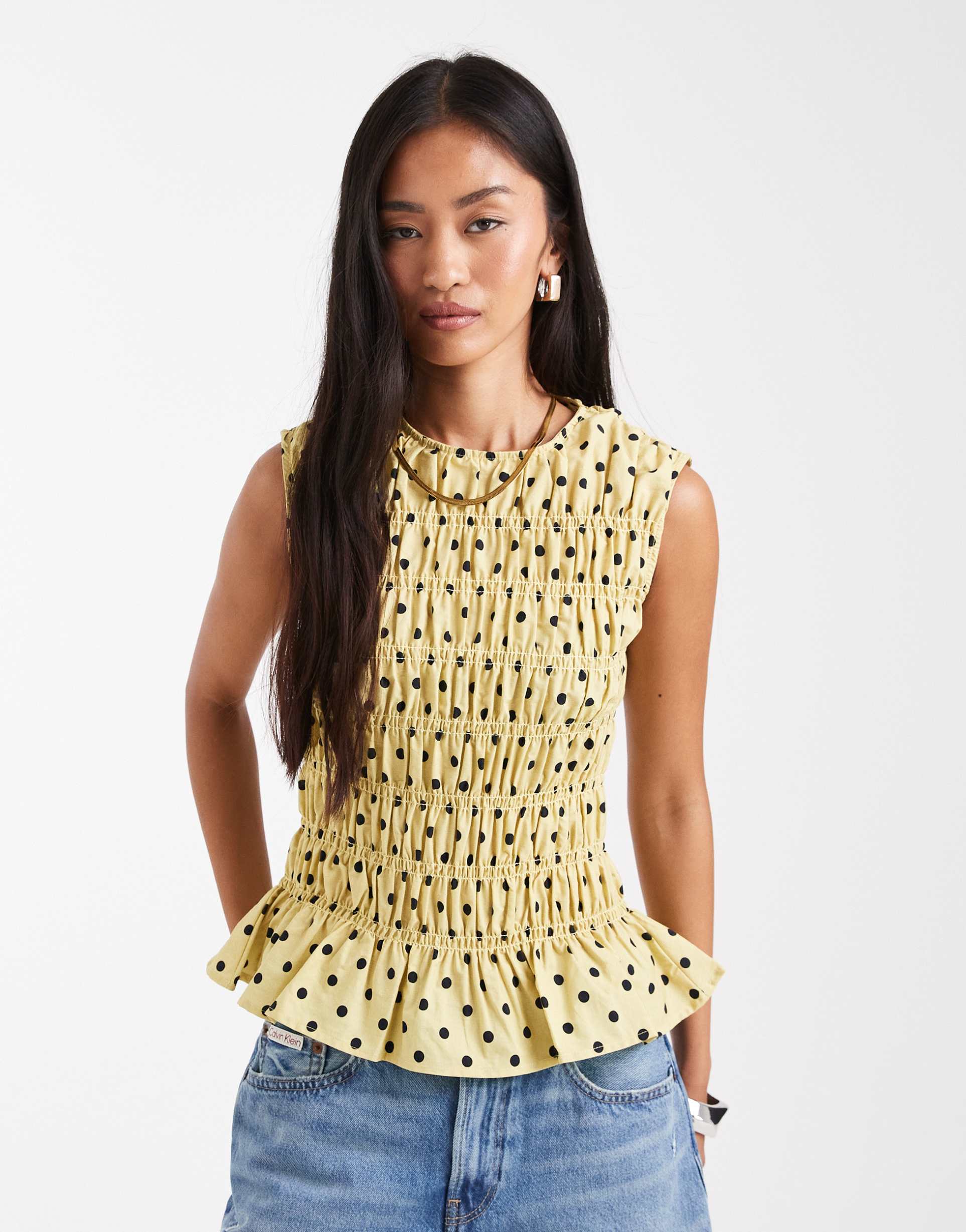 asos design sleeveless shirred top in yellow polka dot