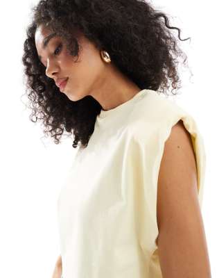 ASOS DESIGN sleeveless shoulder pad top in buttermilk