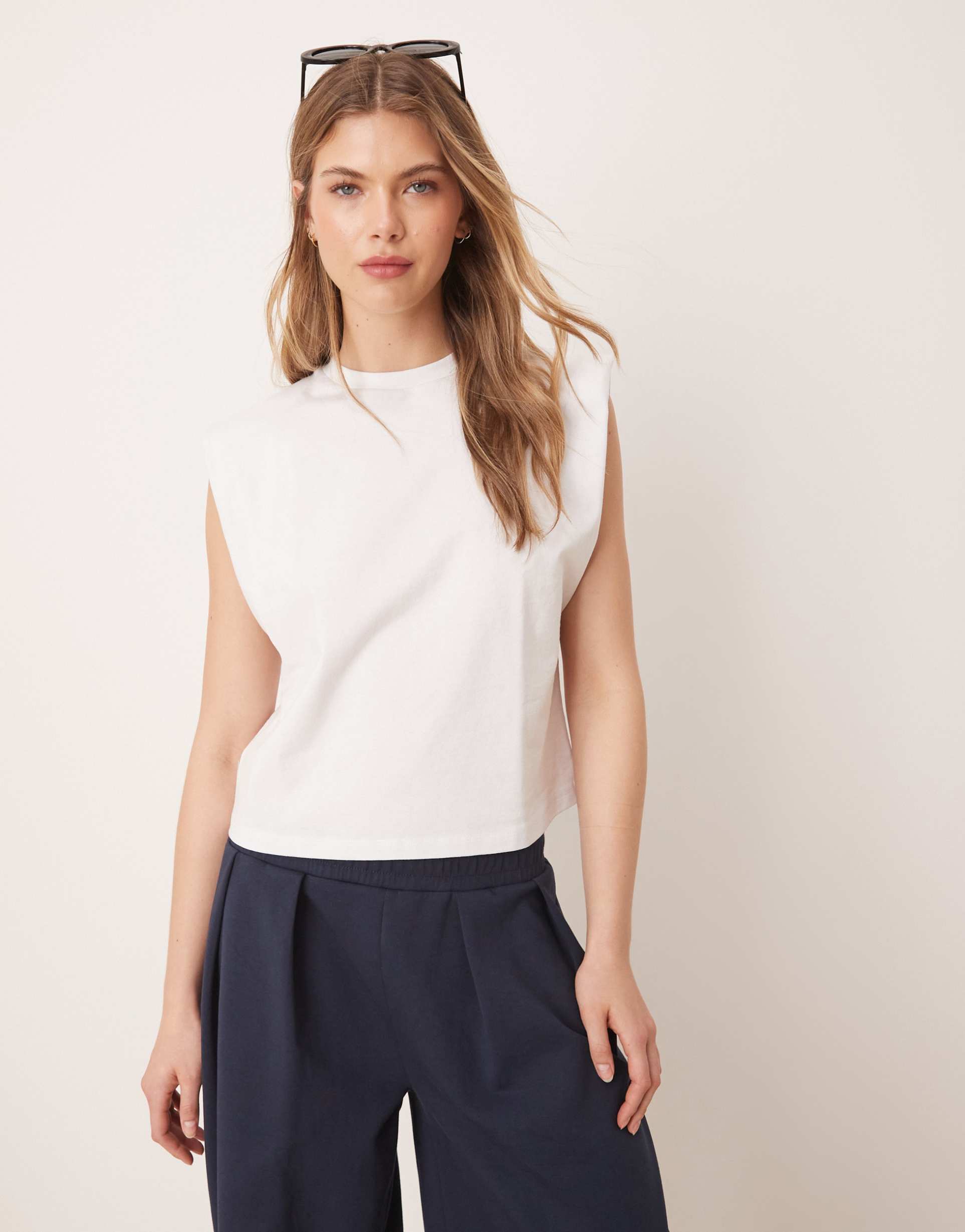 asos design sleeveless shoulder pads top in white