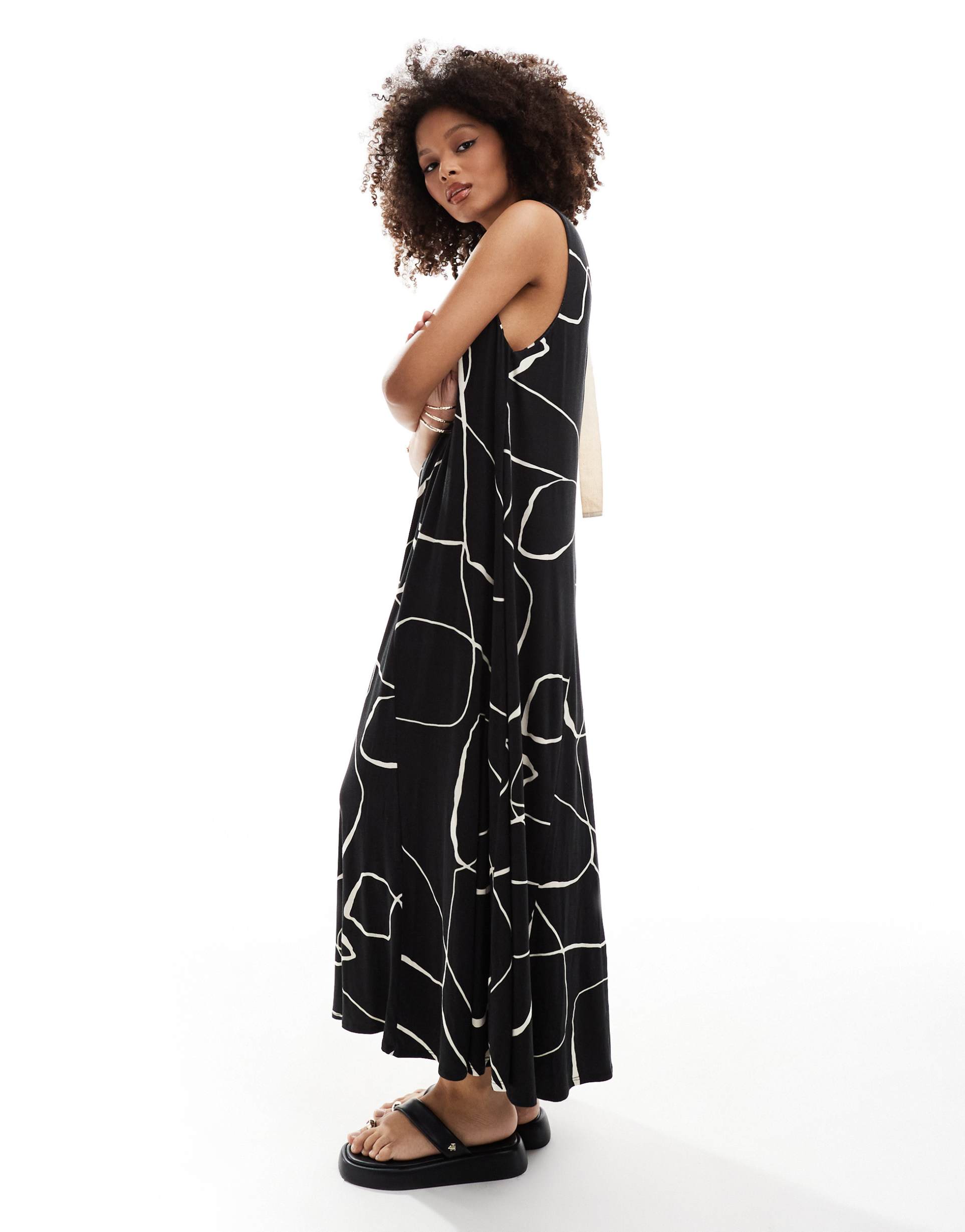 asos design sleeveless trapeze maxi with d ring back detail in black print