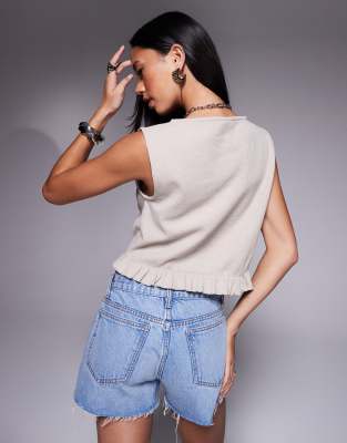 ASOS DESIGN sleeveless waffle button up top in mini frill hem in cream