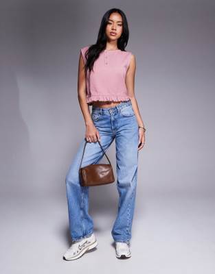 ASOS DESIGN sleeveless waffle top with frill hem in pink
