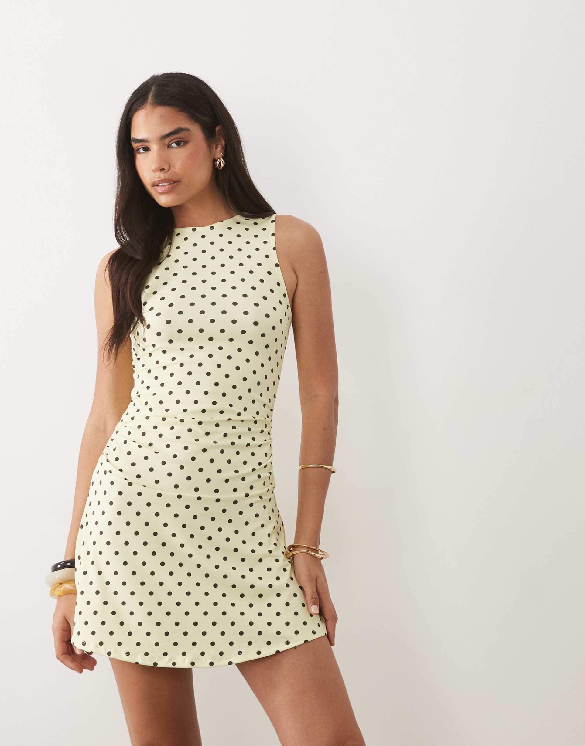 asos design sleeveless with peplum skirt mini dress in yellow polka dot print
