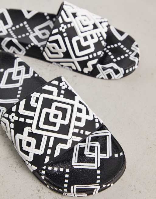 ASOS DESIGN sliders in black and white monogram | ASOS