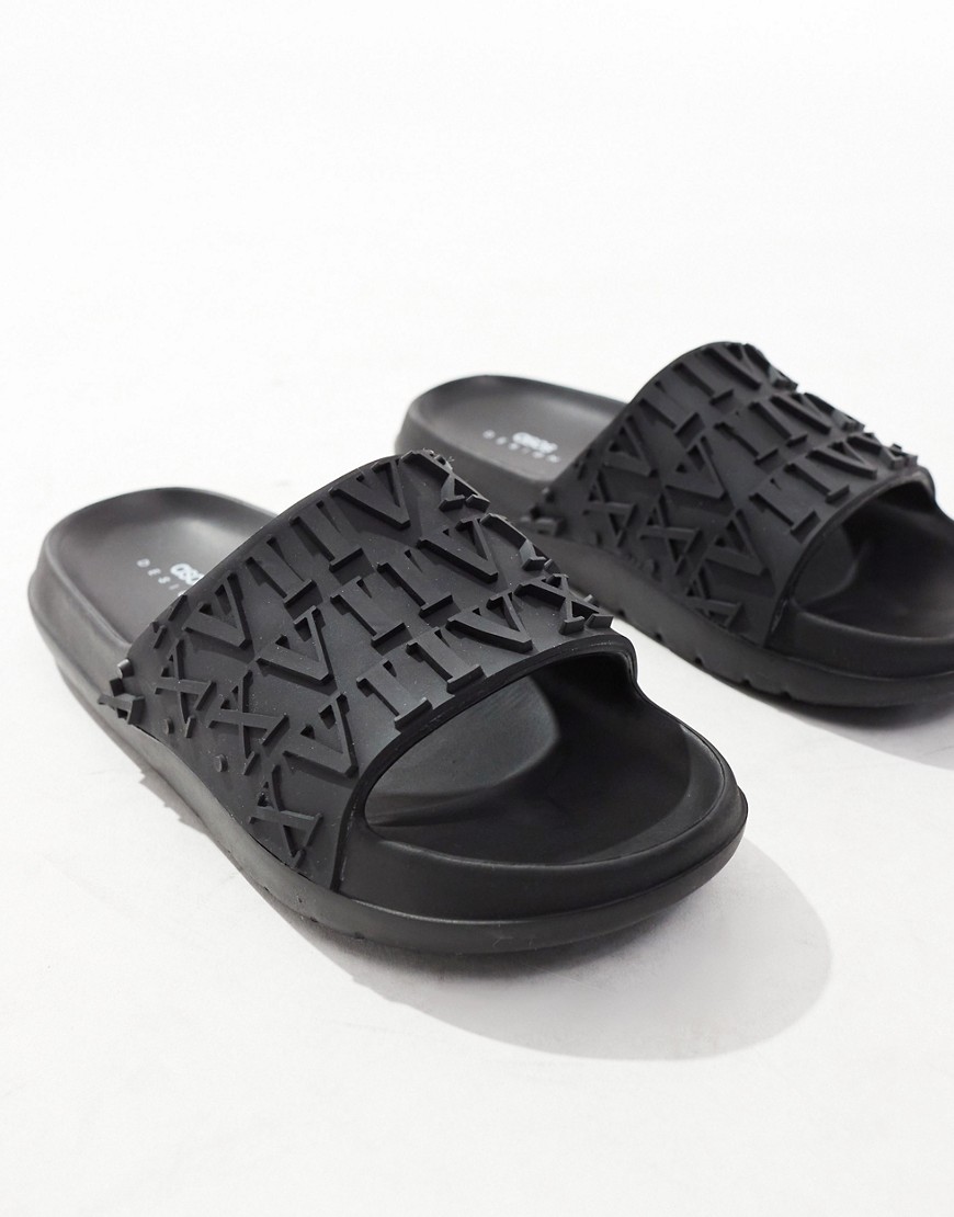 Asos Design Sliders In Black With Embossed Roman Numerals