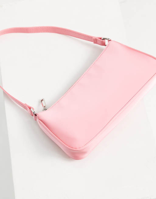 ASOS DESIGN shoulder bag with crystal strapping detail in pink