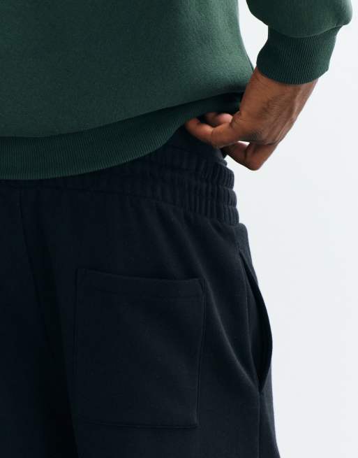 ASOS DESIGN slim balloon trackies in black, 5 of 5