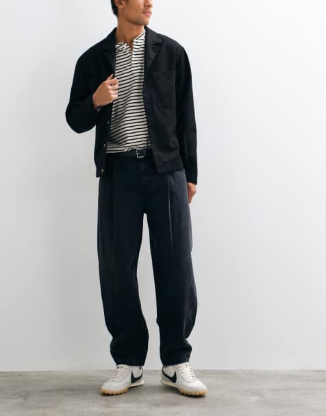 ASOS DESIGN slim barrel jeans in black with pleats - view 1