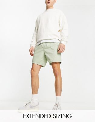 ASOS DESIGN slim chino shorts in mid length in light green
