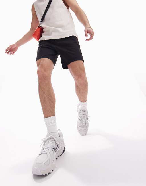 ASOS DESIGN slim chino shorts in mid length in black ASOS