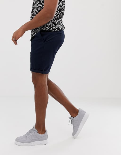 ASOS DESIGN slim chino shorts in mid length in navy, 4 of 4