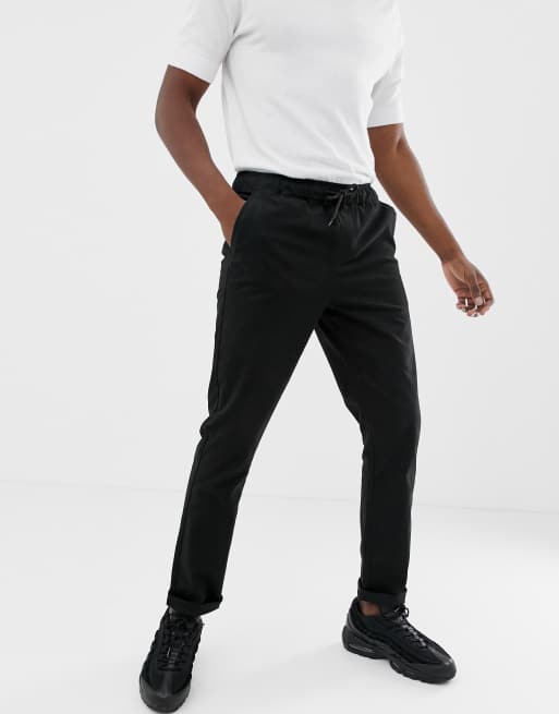 ASOS DESIGN slim chinos in black with elastic waist | ASOS