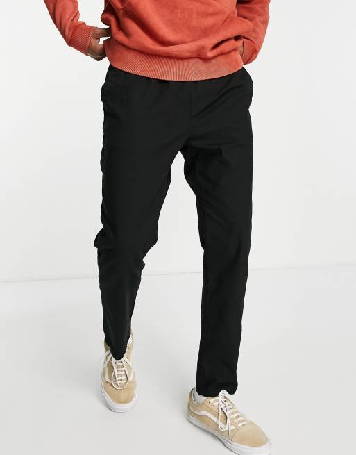 ASOS DESIGN slim chinos with elastic waist in black