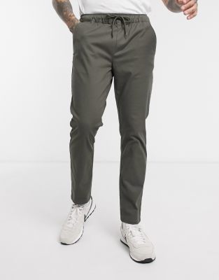 ASOS DESIGN slim chinos with elastic waist in khaki | ASOS