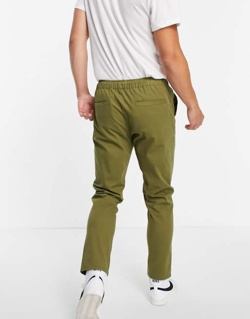 ASOS DESIGN slim chinos with pin tucks and elasticated waist in khaki