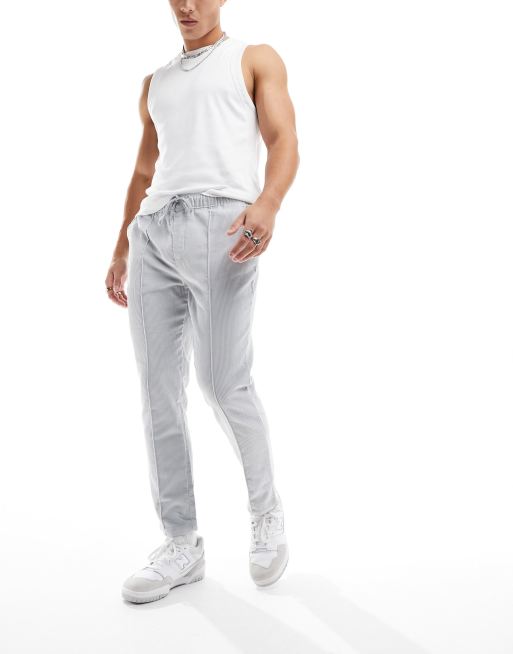 ASOS DESIGN slim cord pants with pin tucks in light gray