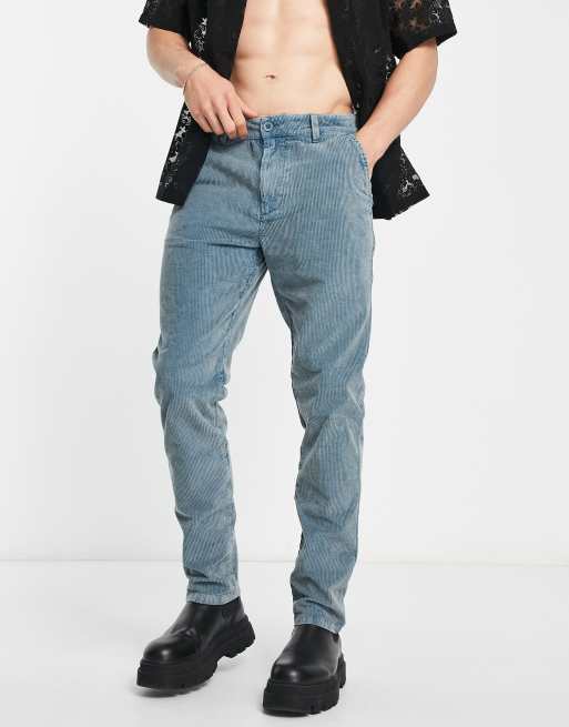 ASOS DESIGN slim cord pants with snow wash in blue