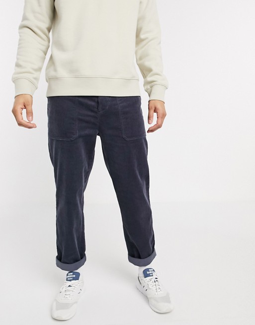 ASOS DESIGN slim cord trousers with utility pockets in blue
