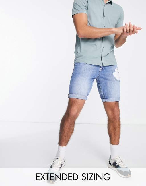 ASOS DESIGN slim denim shorts in dark blue wash with rips 