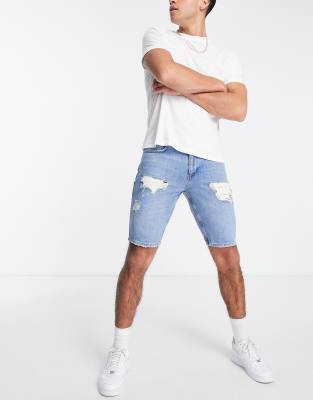 ASOS DESIGN slim denim shorts in mid wash blue tint with rips | ASOS