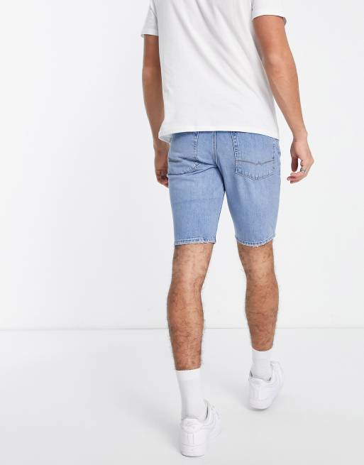 ASOS DESIGN slim denim shorts in mid wash blue tint with rips