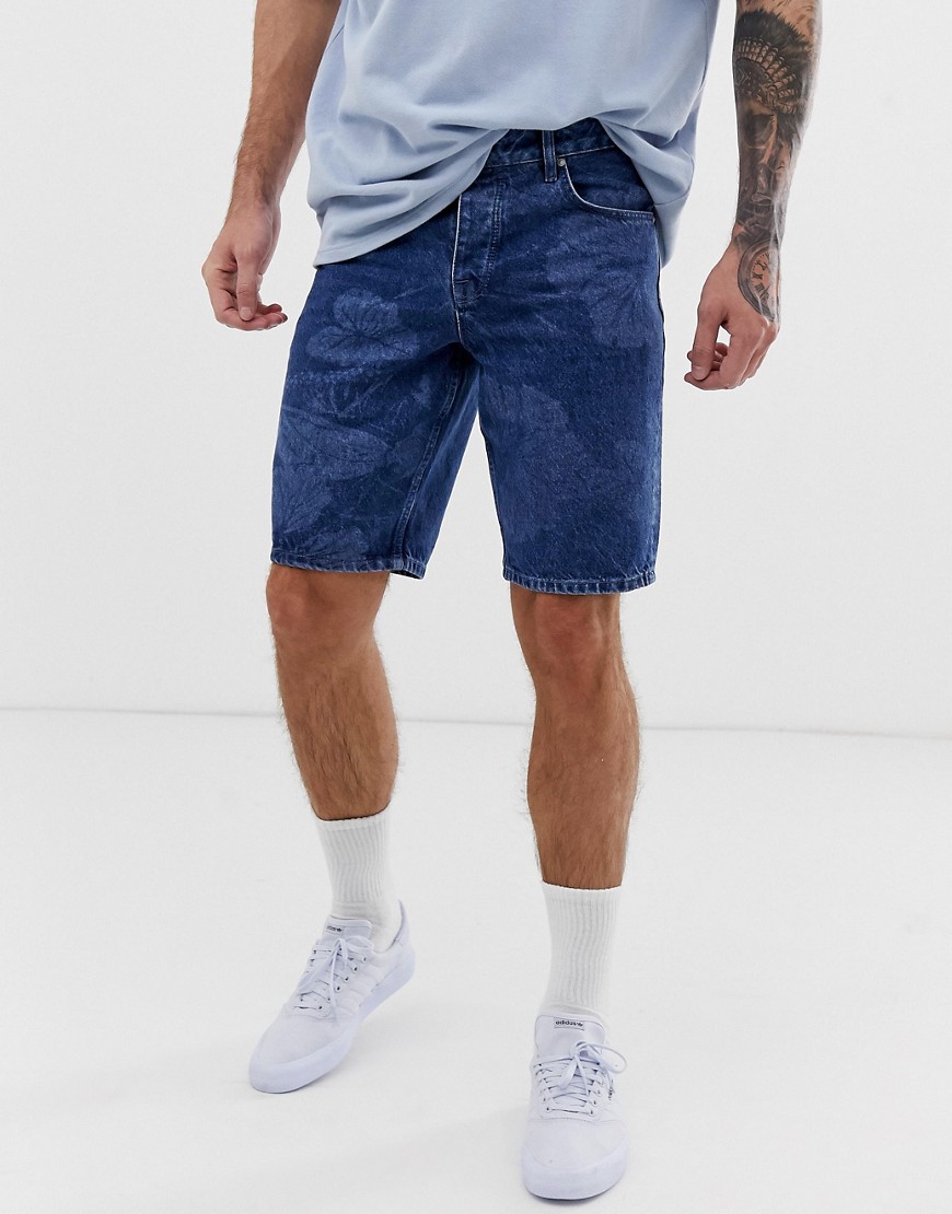 ASOS DESIGN slim denim shorts in mid wash blue with Hawaiian print