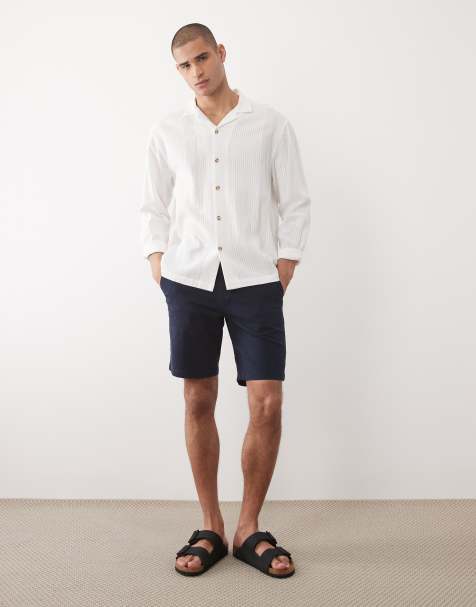 ASOS DESIGN slim fit chino shorts in navy - view 1