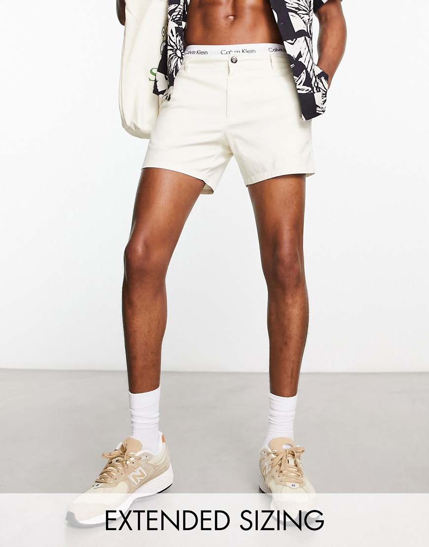 ASOS DESIGN slim fit chino shorts in shorter length in ecru-White