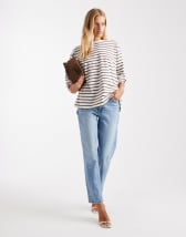 ASOS DESIGN loop through clutch bag in black and cream stripes