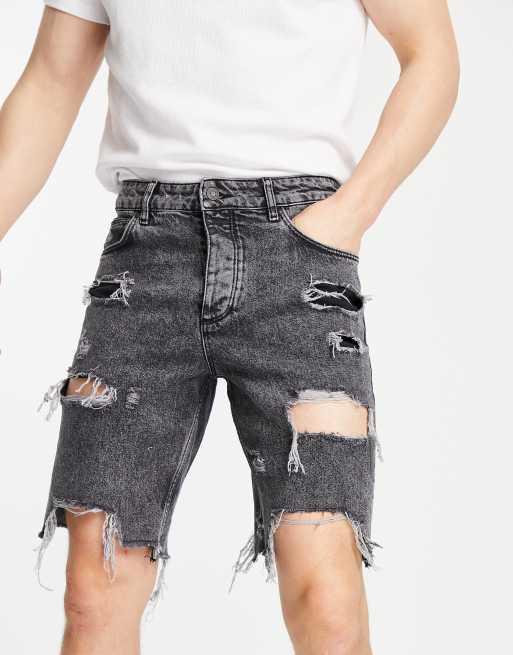 ASOS DESIGN - Slim-fit denim short met grote scheuren en onafgewerkte zoom in zwart met wassing