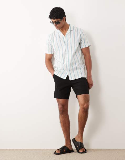 ASOS DESIGN - Slim-fit, halflange chinoshort in zwart - view 1