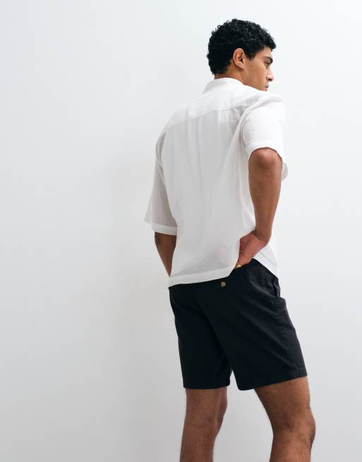ASOS DESIGN - Slim-fit, halflange chinoshort in zwart, 3 van 5