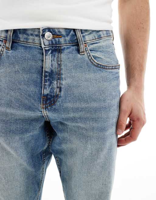 ASOS DESIGN slim fit jeans in light wash blue, 4 of 5