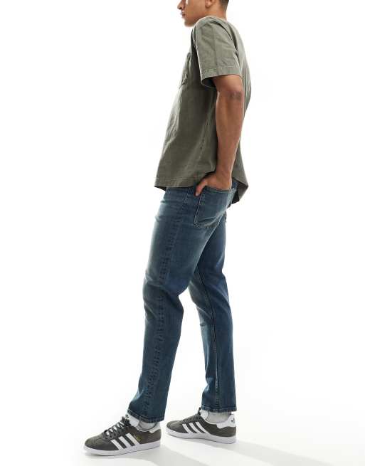 ASOS DESIGN slim fit jeans in mid wash blue, 3 of 5