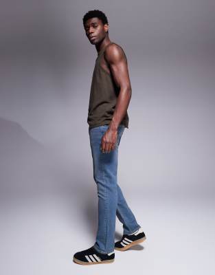 Asos Design Slim Fit Jeans With Tint In Blue
