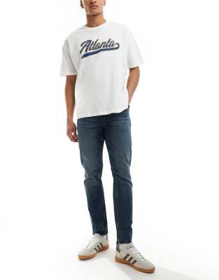 Asos Design Slim Fit Jeans With Vintage Tint In Blue