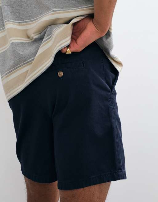 ASOS DESIGN slim fit mid length chino shorts in navy, 3 of 5