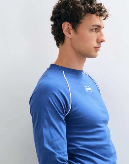 ASOS DESIGN slim fit raglan long sleeve top with piping and chest logo print in navy, 4 of 5