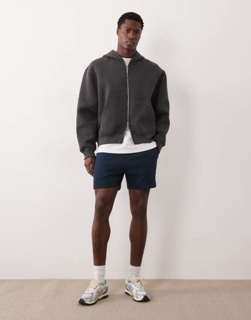 ASOS DESIGN slim fit shorter jersey shorts with contrast side piping in navy, 2 of 5