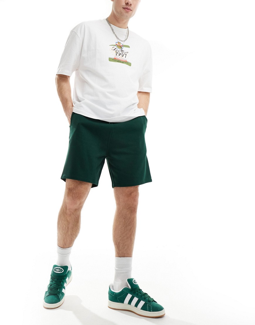ASOS DESIGN slim fit shorts in dark green