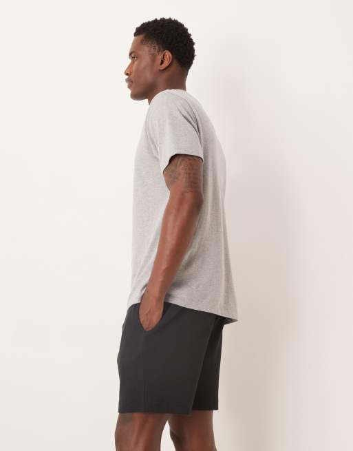ASOS DESIGN slim fit waffle knit jersey shorts with pintucks in black, 2 of 5