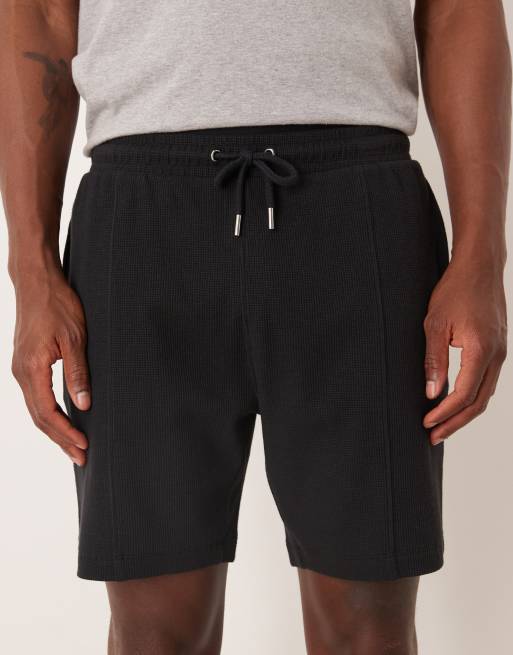 ASOS DESIGN slim fit waffle knit jersey shorts with pintucks in black, 4 of 5