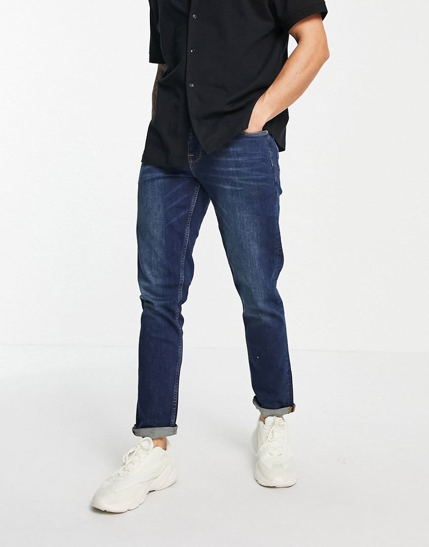 ASOS DESIGN – Slim jeans i mörk tvätt med stretch-Blå