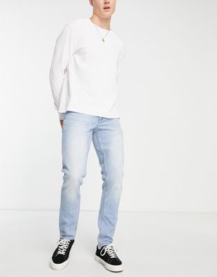 ASOS DESIGN slim jeans in light wash blue   - ASOS Price Checker