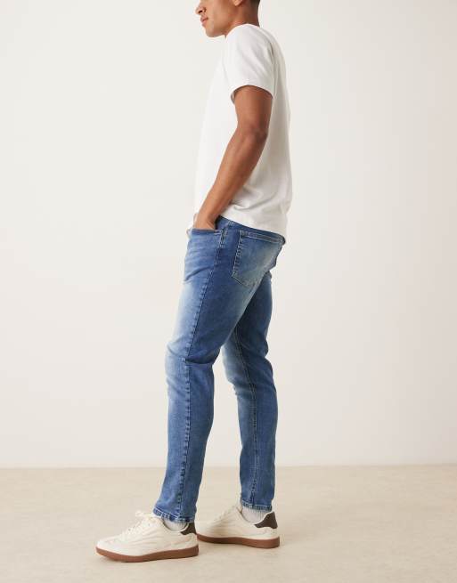 ASOS DESIGN slim jeans in light wash blue, 3 of 5