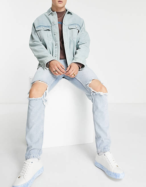 ASOS DESIGN slim jeans in light wash with extreme knee rips